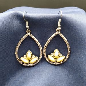 Silver-tone earrings with pale yellow lotus flower